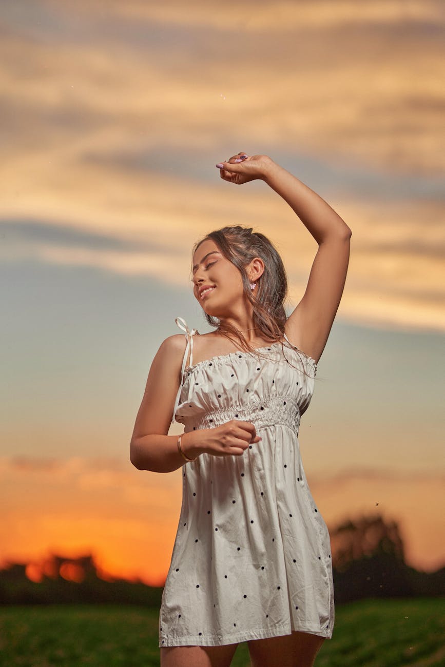 a beautiful woman wearing white dress