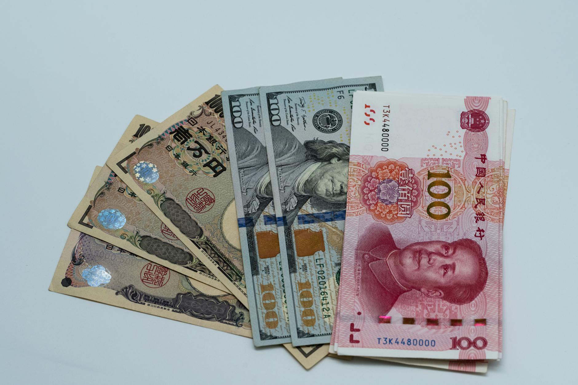 assorted international currency bills on display