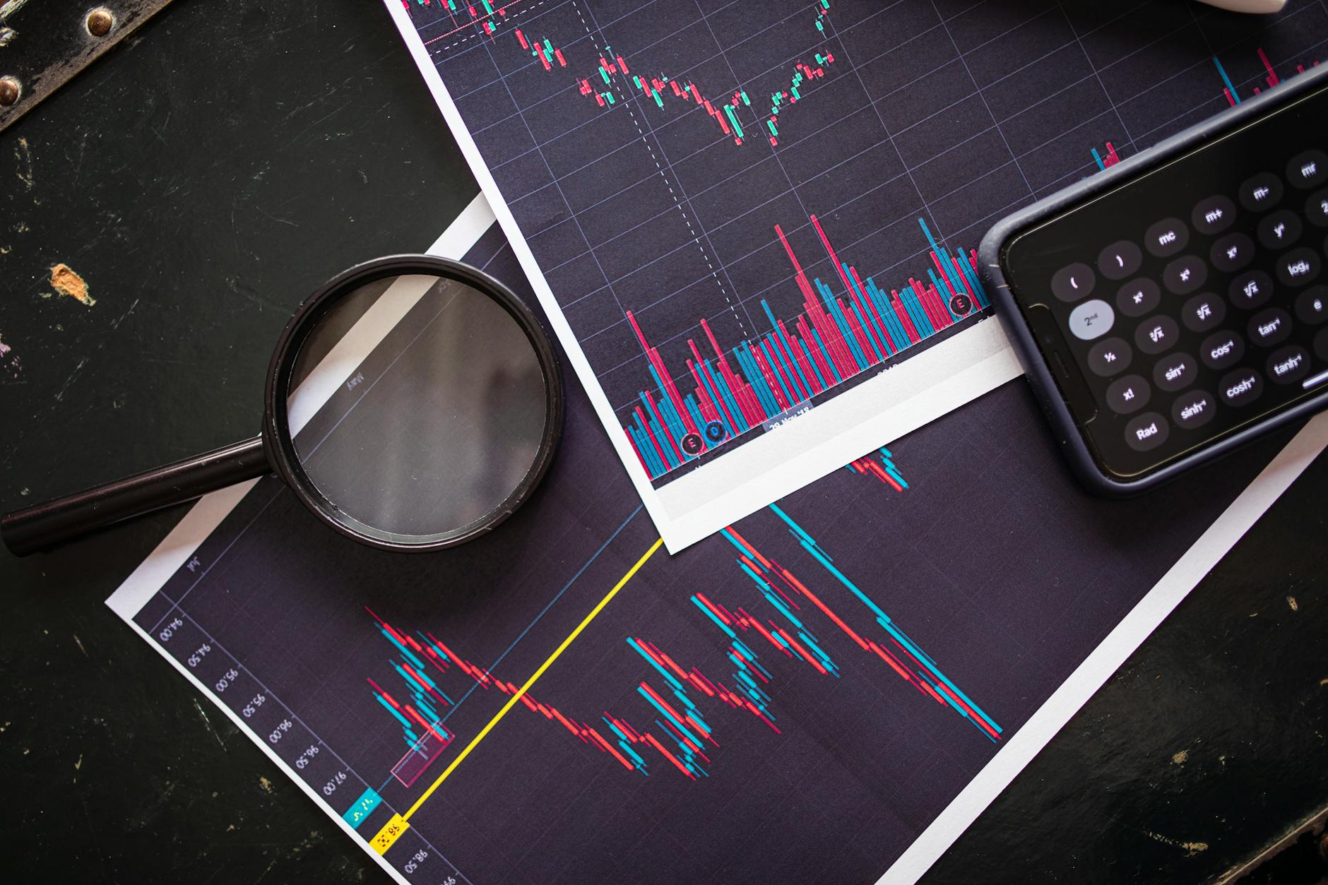 black magnifying glass on black table