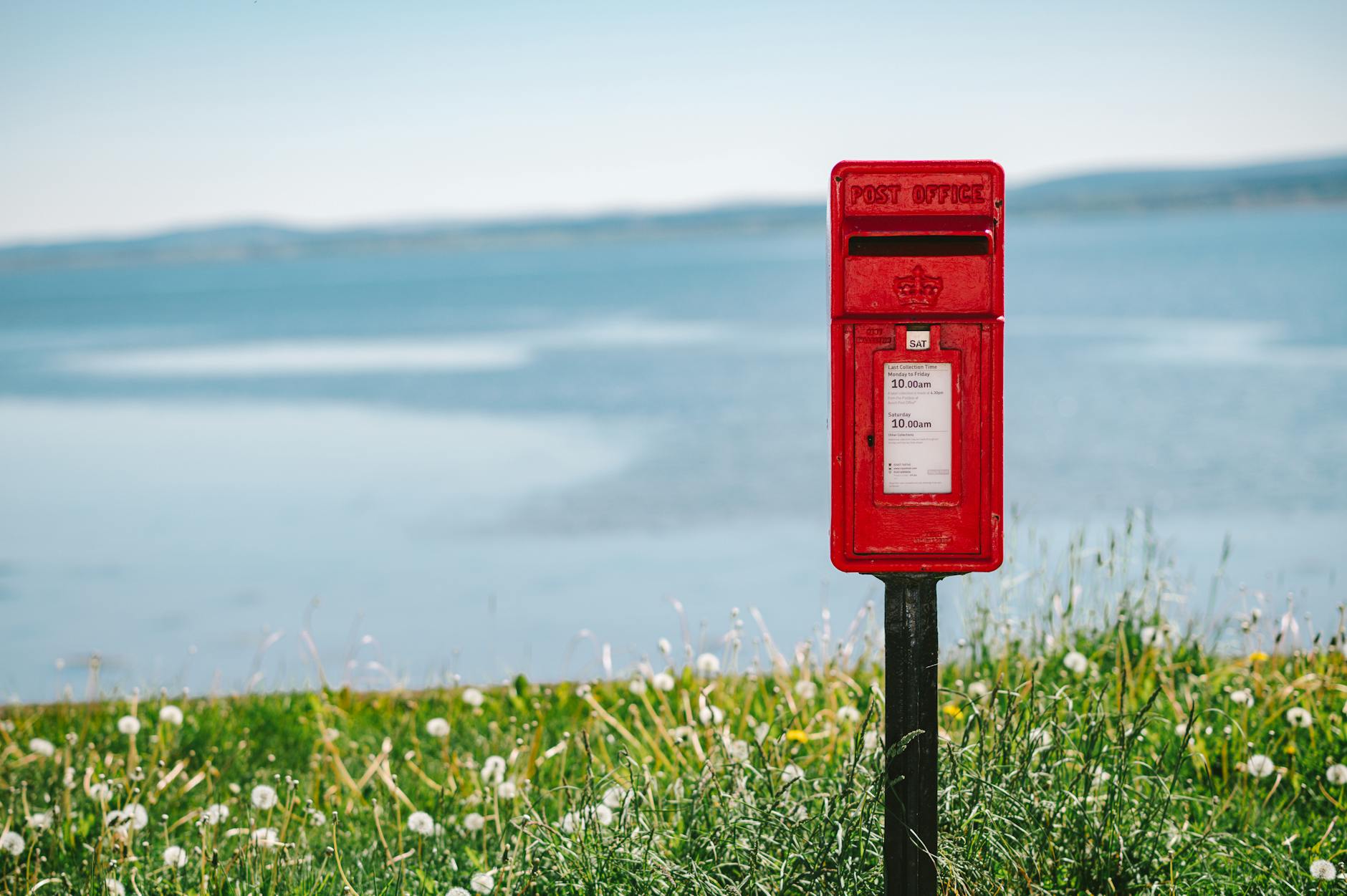 red post box by coastal view in avoch scotland